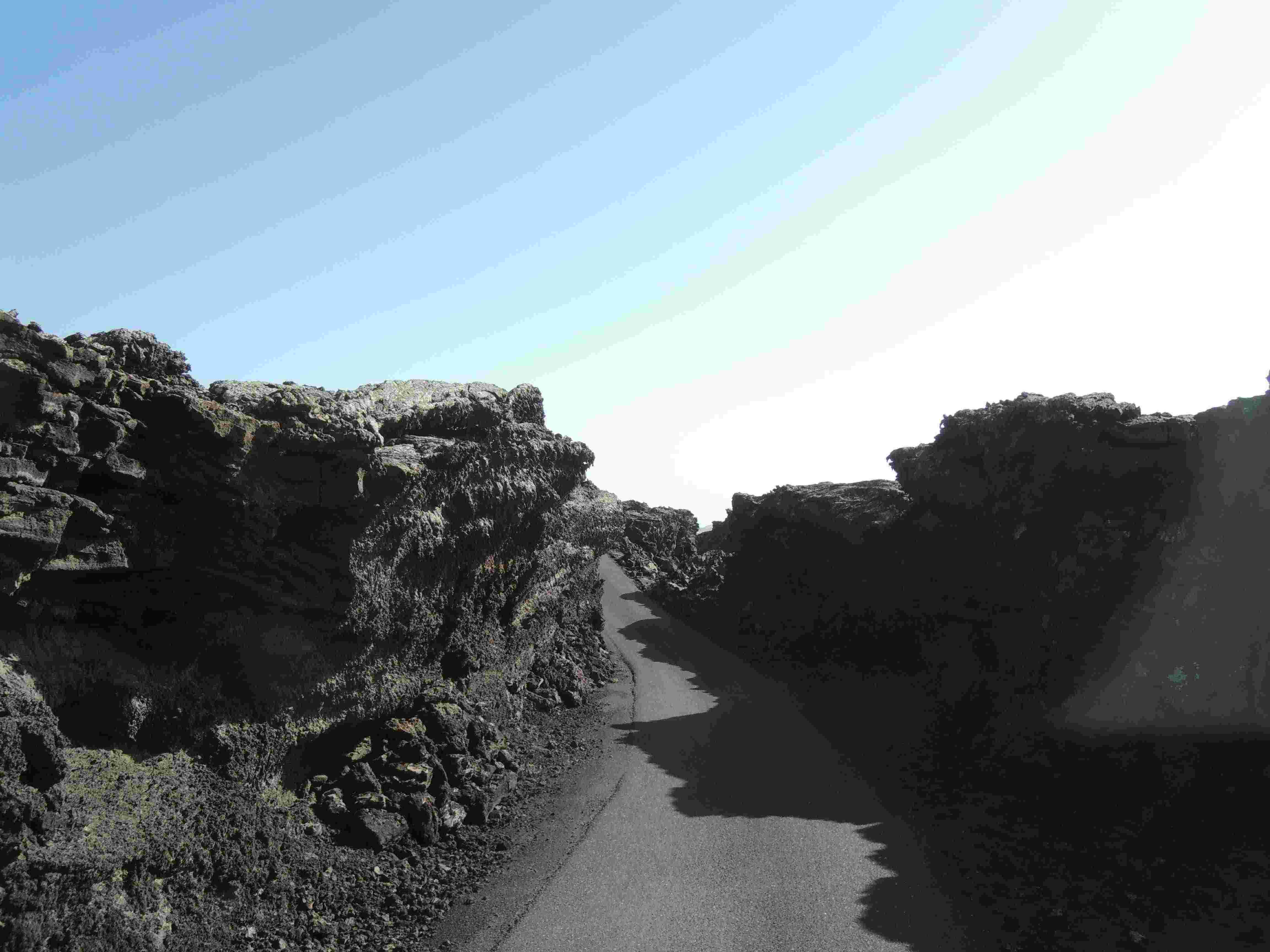 A road has been cut through the lava-rock